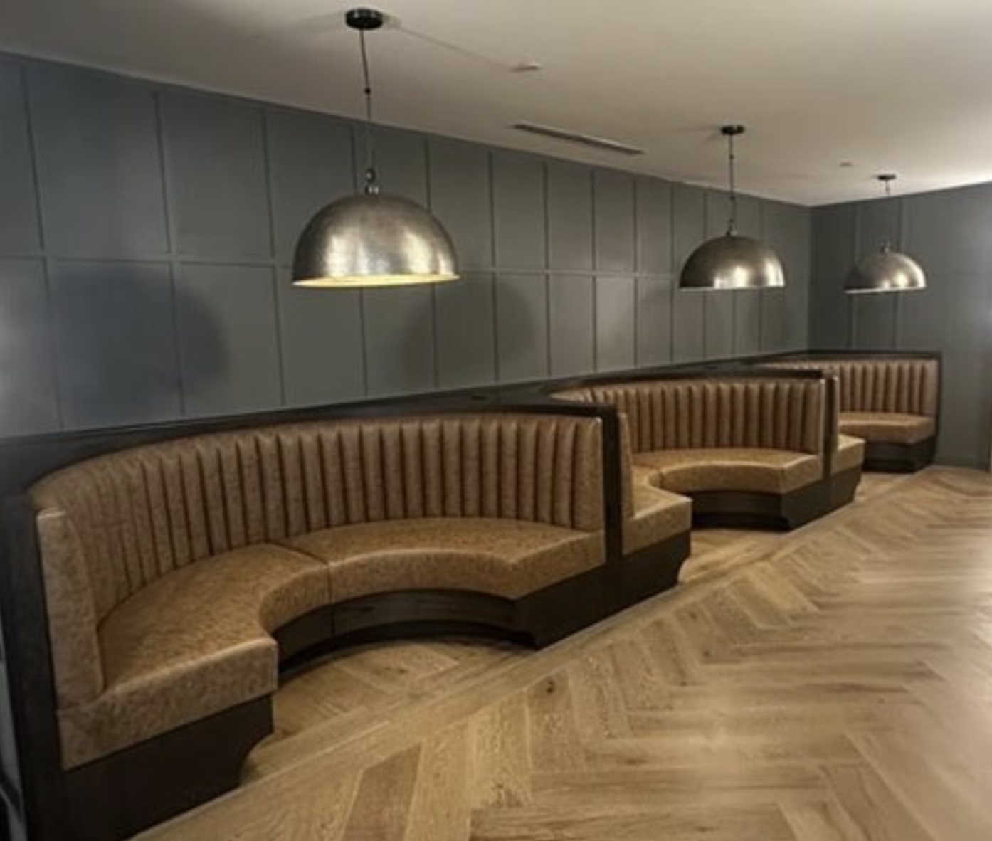 Booths inside the study mezzo at Rambler Columbus. 